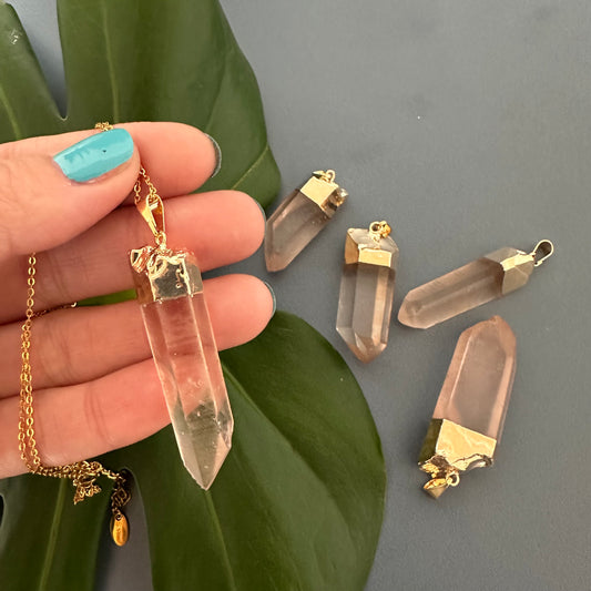 Pink lemurian point pendant