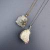 Raw tourmaline in matrix pendant