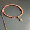 14-karat gold rhodochrosite hamsa hand necklace