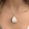 Raw tourmaline in matrix pendant