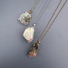 Raw tourmaline in matrix pendant