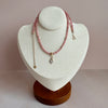 14-karat gold rhodochrosite hamsa hand necklace