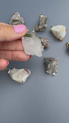 Raw tourmaline in matrix pendant